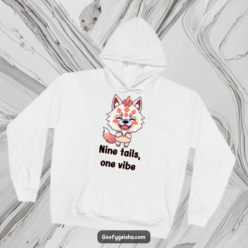 Funny hoodie with a character fearlessly and playfully mimicking a Kitsune mask, offering warmth and a humorous statement.