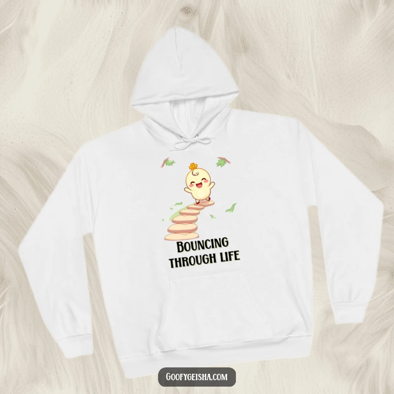 Funny hoodie featuring a giggling lucky charm character bouncing along a path, offering warmth and a symbol of happiness and playful adventures.