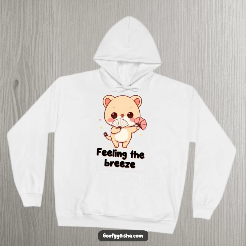 Funny hoodie with a cute character holding a mini paper fan, hilariously wiggling its hips for maximum comedic effect.
