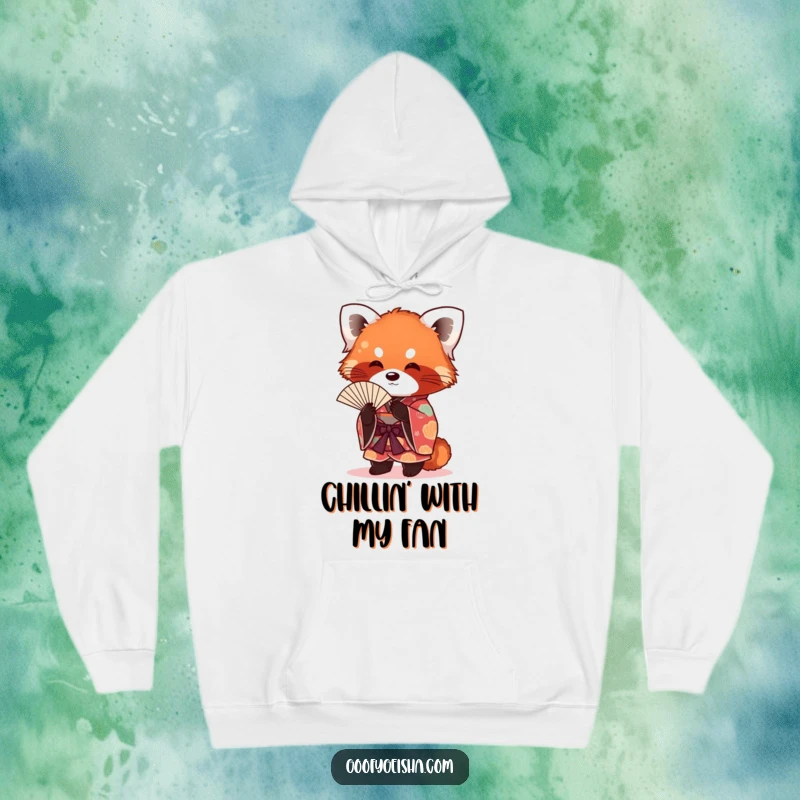 Funny red panda wearing a vibrant kimono, fanning itself to stay cool, depicted on a warm and cozy hoodie.