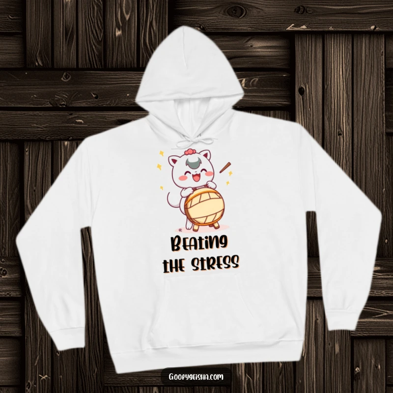 Funny hoodie featuring a Kawaii character happily playing a Taiko drum with exaggerated motions, offering cozy comfort and musical vibes.