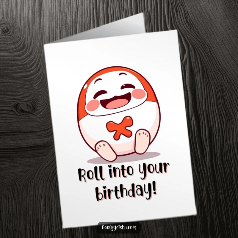 Funny Free Printable Birthday Card: a smiling Daruma doll character cheerfully rolling onto its feet, symbolizing perseverance.