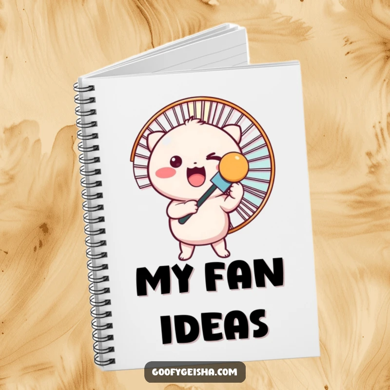 Funny notebook with a cute Kawaii character excitedly holding a large fan, ideal for writing and drawing.