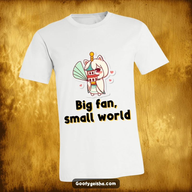 Funny Kawaii t-shirt depicting a playful character using a huge fan to gently blow air at a tiny, exquisite pagoda, showing delightful amusement.