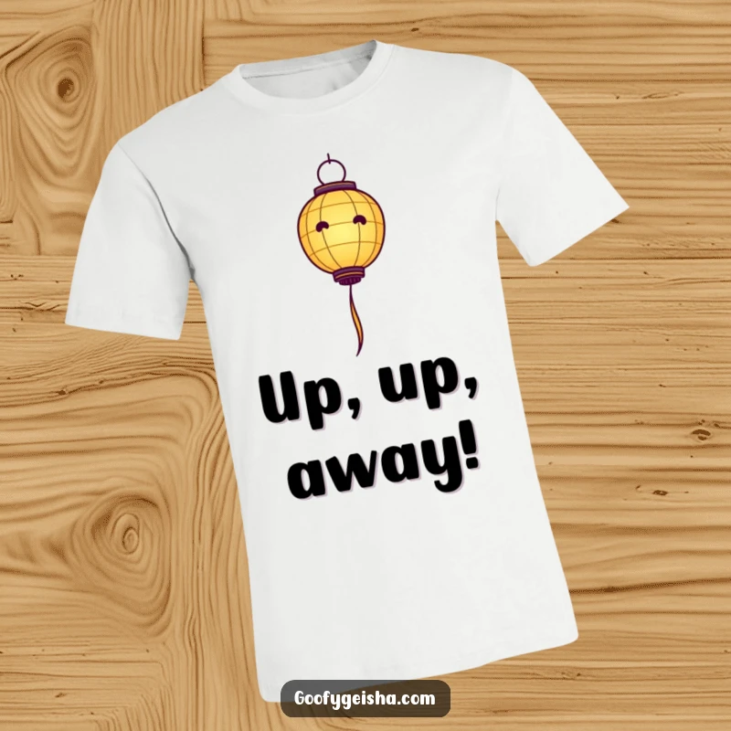 Funny Paper Lantern T-Shirt: A small paper lantern character joyfully ascends, trailing colorful streamers in a delightful design.