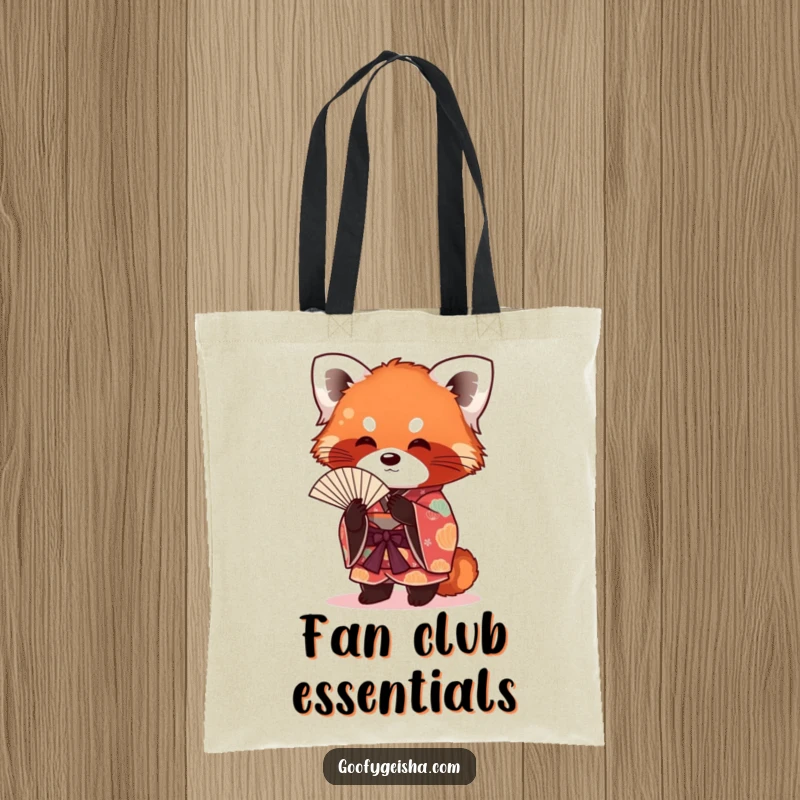 Funny red panda in a festive kimono, fanning itself with a stylish flair, perfect for a durable and amusing tote bag.