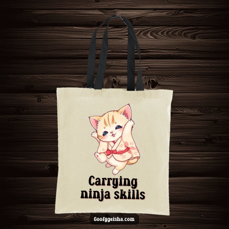 Funny kitten tote bag showcasing a kitten in a kimono mid-somersault, adding a touch of playful elegance.
